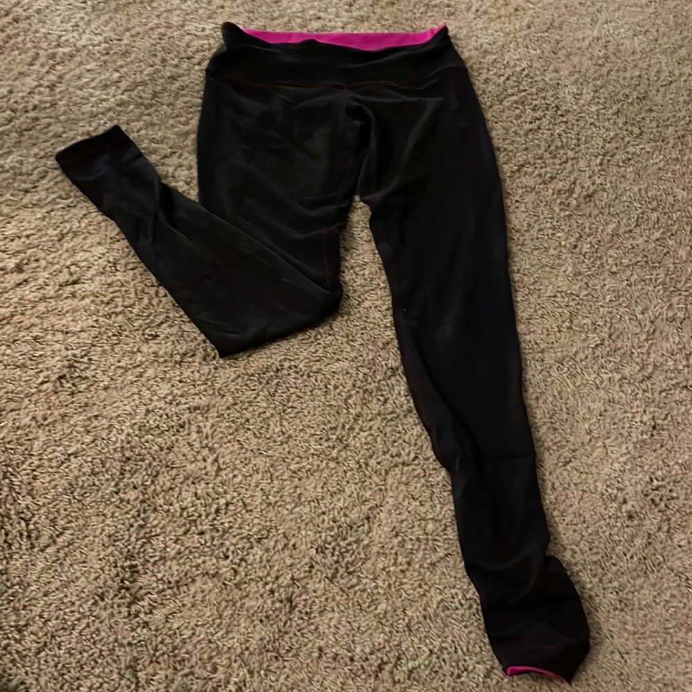 Reversible lulu hot pink and black leggings